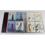 Aland post office stamped postcards & maxim cards (approx 145) in binder. VGC