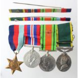 Group mounted as worn to 6284087 S.Sjt E J Morris RAMC. 1939-45 Star, Defence & War Medal,