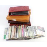 GB - large clear plastic crate of Presentation Packs c1971 to 2002 in 4x albums and loose. Noted
