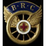 British Red Cross Society Motor Ambulance V.A.D. brass & enamel badge. Has a Maker's tablet on the
