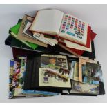 Box of stamps in albums, covers, in packs and on leaves. Worth a good look. (Qty) Buyer collects