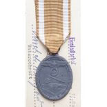 German West Wall Medal with award document to Bermhard Urschel awarded 17.11.1940 on behalf of the