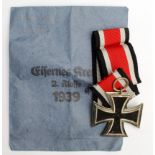 German Iron Cross 1939 2nd Class, with ribbon and packet of issue, maker marked '128'.