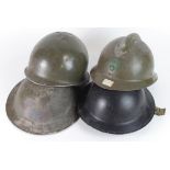 Military helmets:- French Adrian helmet with liner and chin strap, stamped 'I' to rim. British