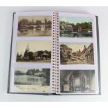 Surrey Postcards: A grey album containing a fine collection of Surrey postcards. Lots of good