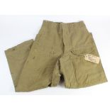 Very early Denim Battledress Overall Trousers, complete with ankle tabs and heavy service wear.