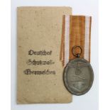 WW2 Unissued German West Wall Medal and packet
