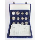 USA in a blue "Westminster" case. Includes Dollars, commemorative Half-Dollars etc. All high grade