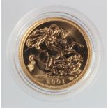 Half Sovereign 2001 BU in a hard plastic capsule