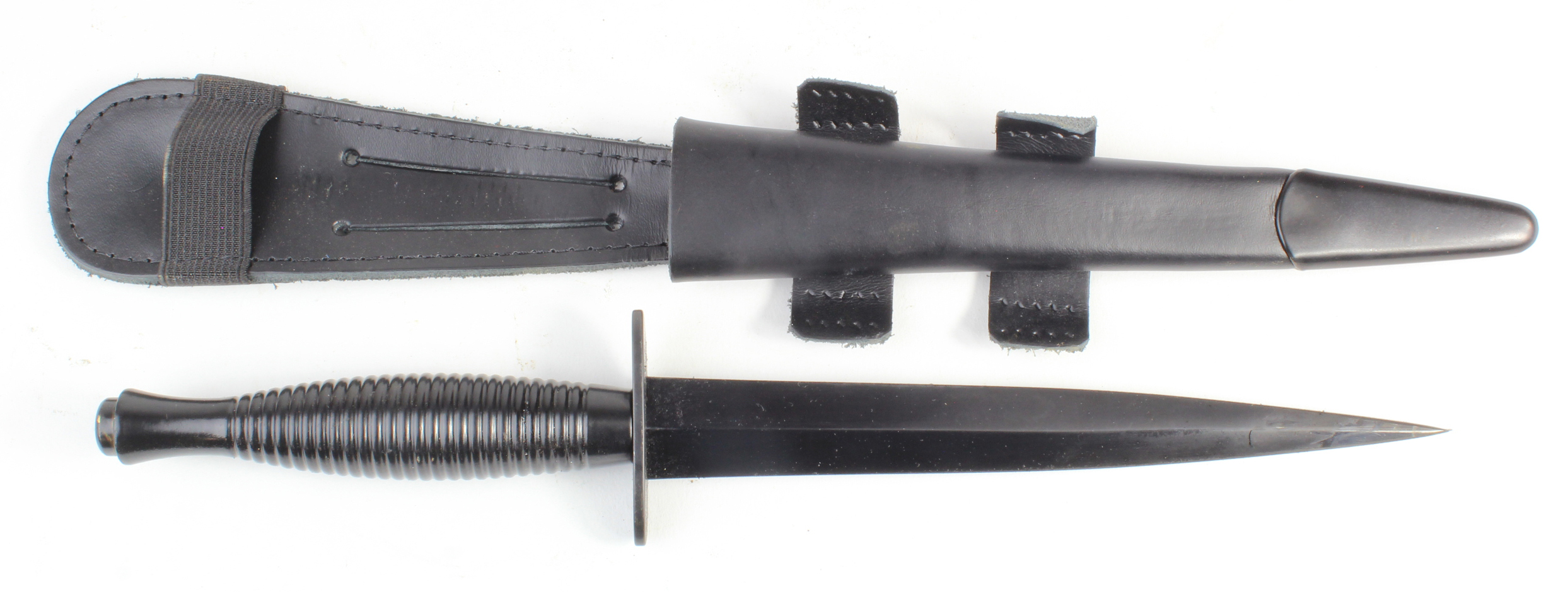 British Commando Current day issue dagger and scabbard. Marked "Sheffield England" and a Broadband