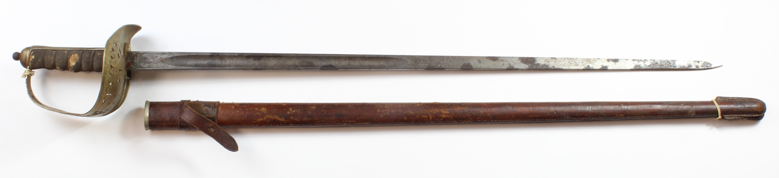 Sword: An 1897 Pattern Infantry Officers Sword with Geo V Cypher. Etched blade with Geo V.Cypher.