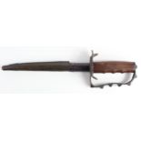 Knife: A U.S. Model 1917 Trench Knife by L.F. & C. Company. Triangular blade 8.75" stirrup hilt.