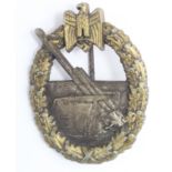 WW2 Kriegsmarine Ersatz Issue Coastal Artillery Badge. Made in Tombac with gold painted laurels.