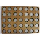 USA Silver Half Dollars (28) in a home-made wooden tray, mostly Walking Liberty and Franklin,