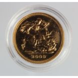 Half Sovereign 2009 BU in a hard plastic capsule