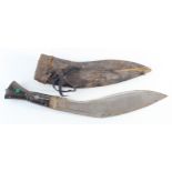 Kukri: A working Kukri early/mid 20th Century. Blade 10.5". Blade stamped 'Tempered Steel' & 'Made
