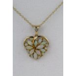 9ct hallmarked Gold Opal set Heart shaped Pendant on a fine 18 inch chain weight 3.0g