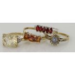 Four 9ct assorted mixed gemstone rings, weight 10.5g