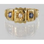 18ct ring set with diamond and sapphires, finger size P, weight 3.3g