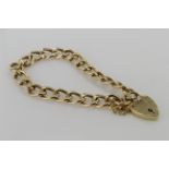 9ct yellow gold charm bracelet with heart padlock clasp and safety chain, weight 12.2g
