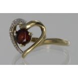 9ct yellow gold heart shaped ring set with garnet and diamonds, finger size M, weight 1.7g