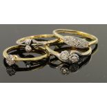 Four 18ct yellow gold and platinum diamond set rings, weight 7.6g