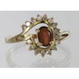 9ct yellow gold garnet and diamond cluster ring, finger size N, weight 2.5g