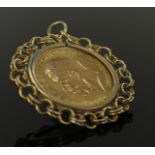 1915 Gold Sovereign in Yellow metal (tests 9ct) mount weight 10.9g