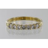 18ct hallmarked seven stone Diamond Ring (approx 0.35ct weight) size O weight 2.7g