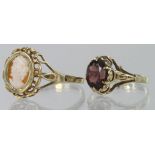 Two 9ct rings, one cameo ring finger size U, weight 2.1g. One garnet ring, finger size K, weight 1.