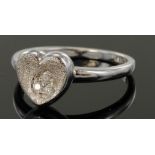 9ct white gold heart shaped ring set with three diamonds totalling 0.05ct, finger size O, weight 2.