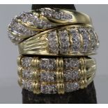 Three 9ct yellow gold diamond set dress band rings, total weight 10.7g