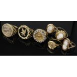 Seven 9ct gold /yellow metal rings. Total weight 27.4g