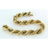 Yellow metal (stamped 585) rope bracelet, approx 20cm, weight 23.6g