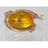 9ct rose gold ring set with single amber stone, finger size M, weight 2.8g