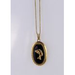 18ct yellow gold onyx pendant with Egyptian motif on 18ct chain, weight 9.5g