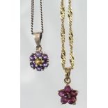 9ct hallmarked Gold Floral pendant on a 16 inch chain (3.7g) plus a Silver pendant and Chain (2)