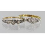 Two 18ct yellow gold three stone diamond rings, weight 3.7g