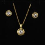 18ct yellow gold pendant and chain set with single diamond of approx. 0.50ct in a rub over