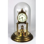 Brass Anniversary clock, circa early 20th Century, with rotating pendulum, under a glass dome, total
