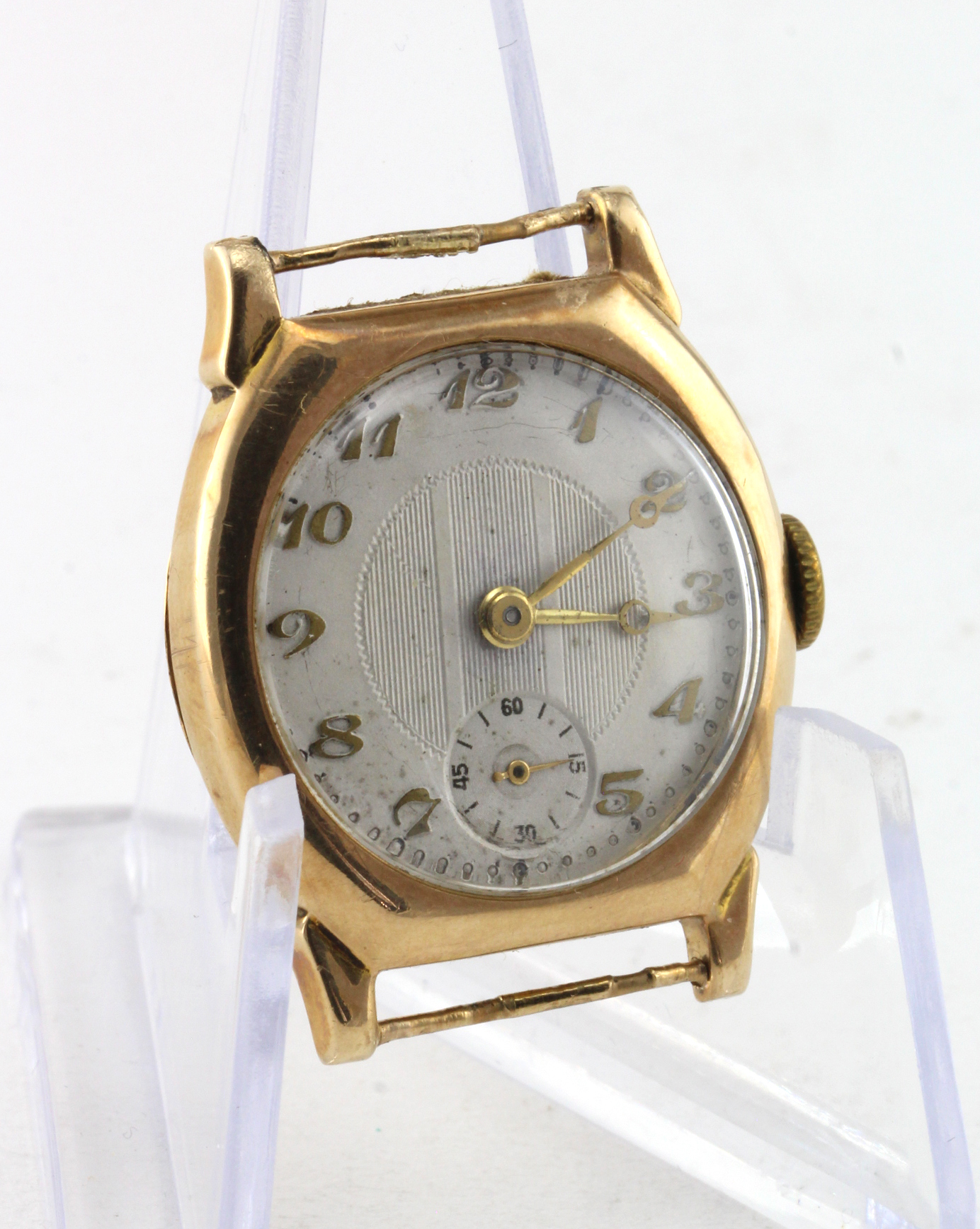 Gents 9ct cased (hallmarked Chester 1928) wristwatch. The cream dial with gilt arabic numerals and