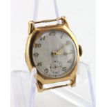 Gents 9ct cased (hallmarked Chester 1928) wristwatch. The cream dial with gilt arabic numerals and