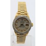 Ladies Rolex oyster perpetual datejust wristwatch, the 26mm mother of pearl dial with diamond