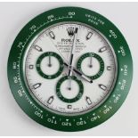 Advertising Wall Clock. Green 'Rolex' advertising wall clock, white dial reads 'Rolex Oyster