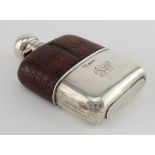 Silver, glass and leather spirit flask, silver parts hallmarked 'G&J W. H, Sheffield 1906'. Free