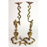Pair of large Indian brass cobra candlesticks, height 53cm approx.