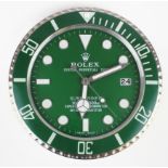 Advertising Wall Clock. Green & chrome 'Rolex' advertising wall clock, green dial reads 'Rolex