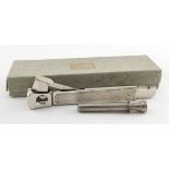 Silver mounted and steel cigar cutter, hallmarked Birmingham, 1959, and a steel cigar piercer and