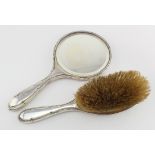 Silver backed mirror and silver backed hair brush, both hallmarked 'Birmingham, 1919'