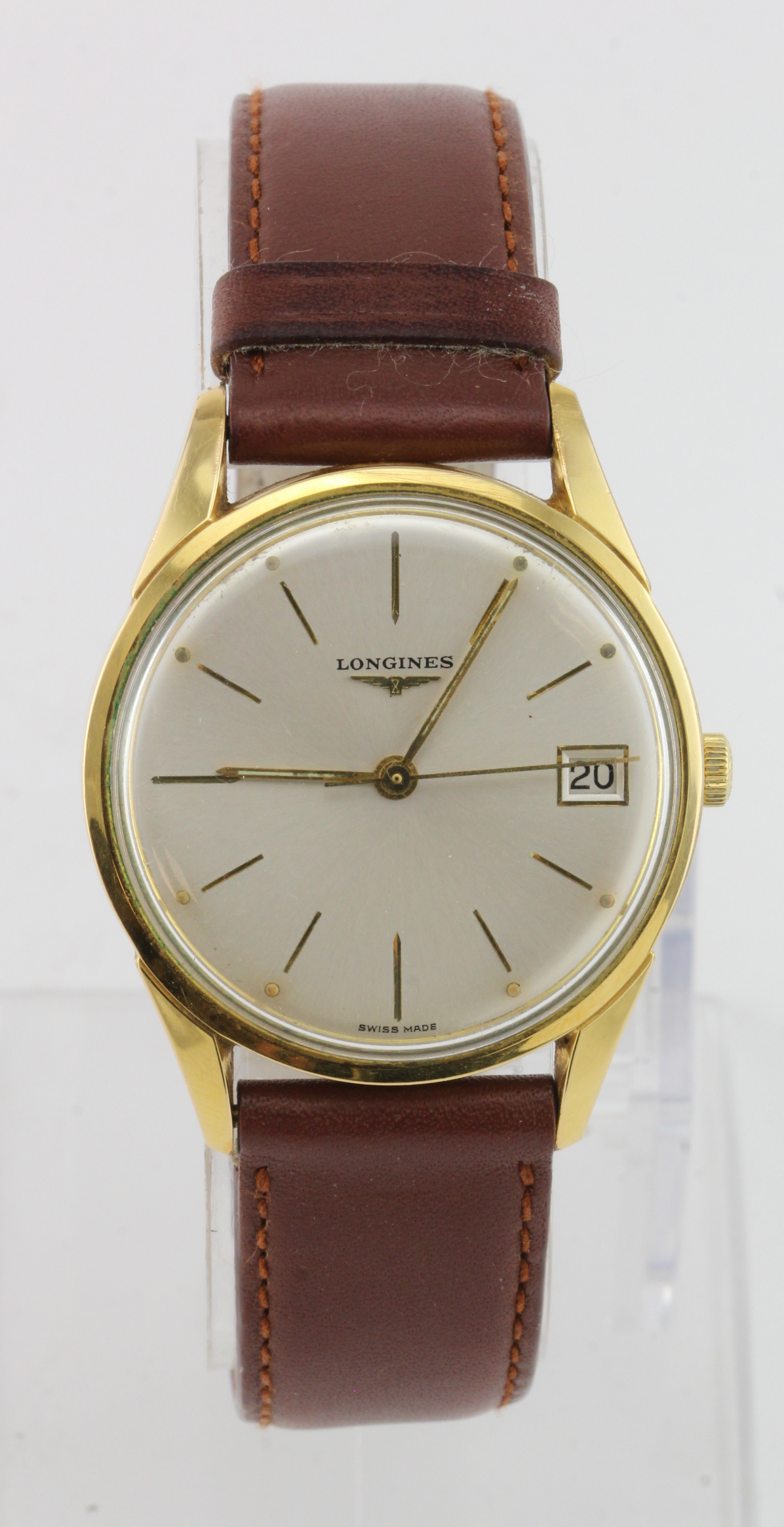 Gents gold plated Longines wristwatch. The cream dial with gilt baton markers and date aperture at 3